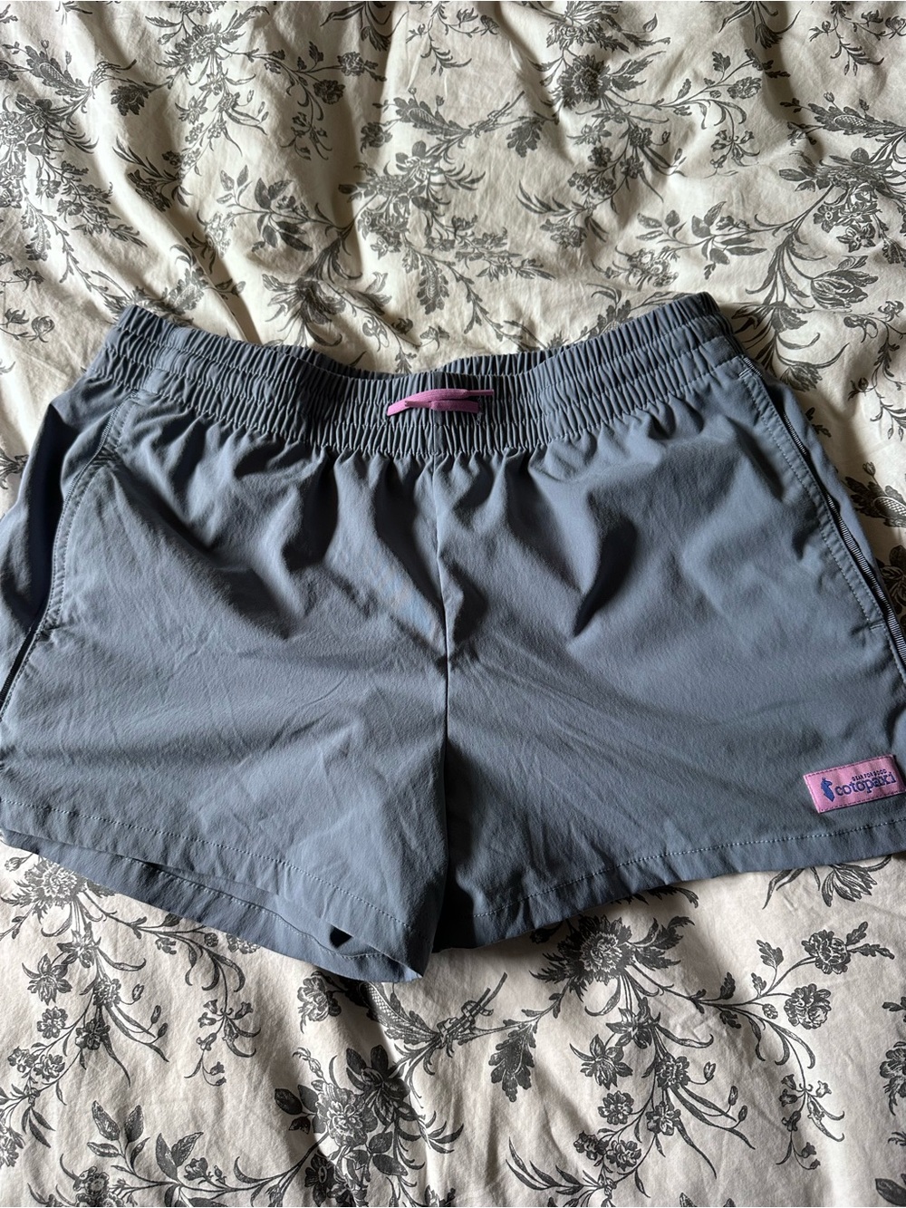 cotopaxi Slate Gray Athletic Shorts with Pink Accents